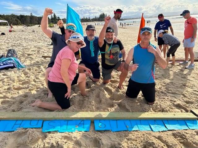 Byron Bay Amazing Race The Chill Way experience for staff to explore Byron Bay beaches, here registered teams compete for a word puzzle winning rettel challenge